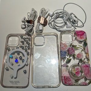 Three iPhone 13 cases and headphones